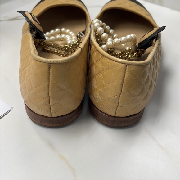 AUTHENTIC CHANEL Black and Tan Flats with Pearl Embellishments - Picture 7 of 13